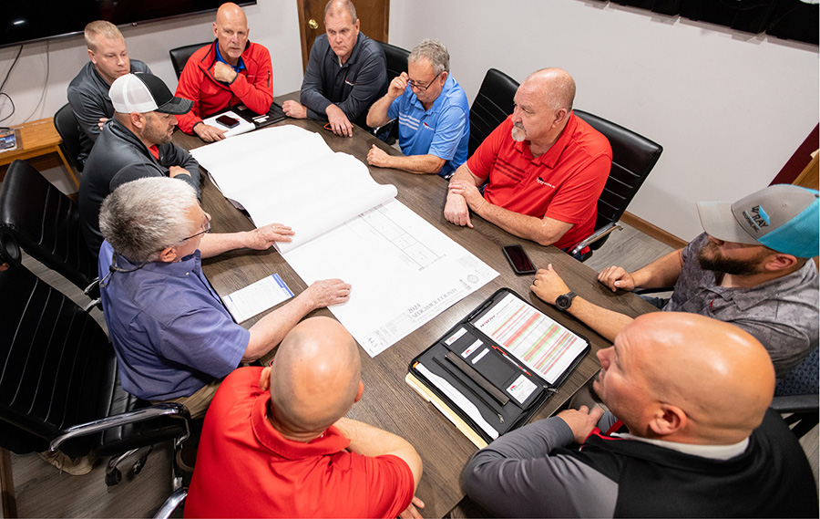 At the Wray Roofing conference table